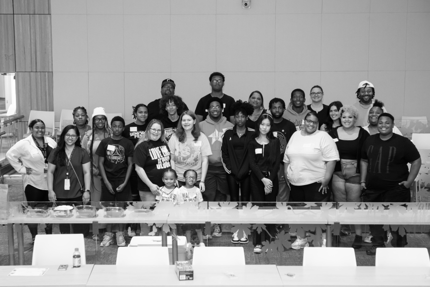 Large group of smiling participants