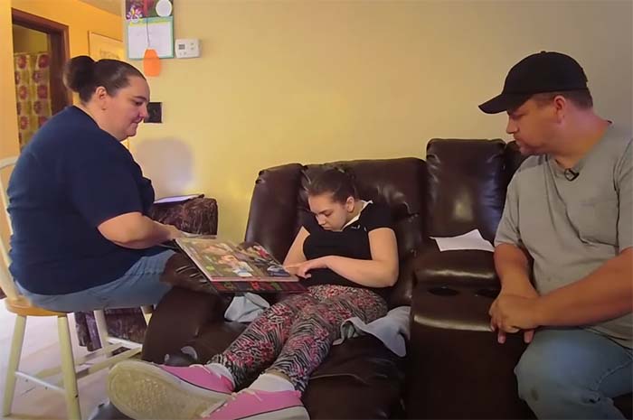 Image of a patient family working with a care coordinator.