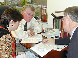 Dr. Gail Gordillo, Dr. Terry Davis and Dr. Robert Ruberg are shown discussing fine details of the operative procedure with a surgical and anesthesia team in Australia, scheduled to perform their first Jeune's chest expansion.