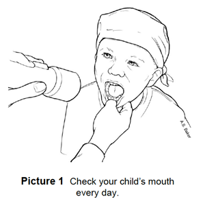 checking a child's mouth with a flashlight