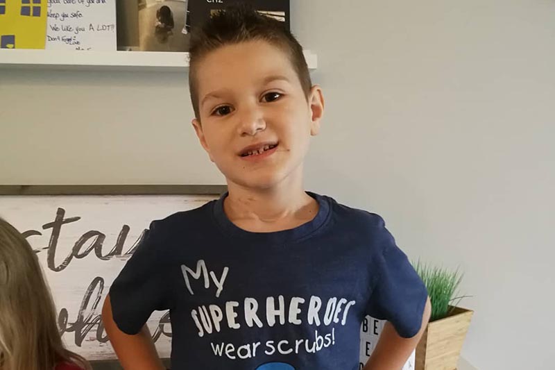 Young patient smiling with family