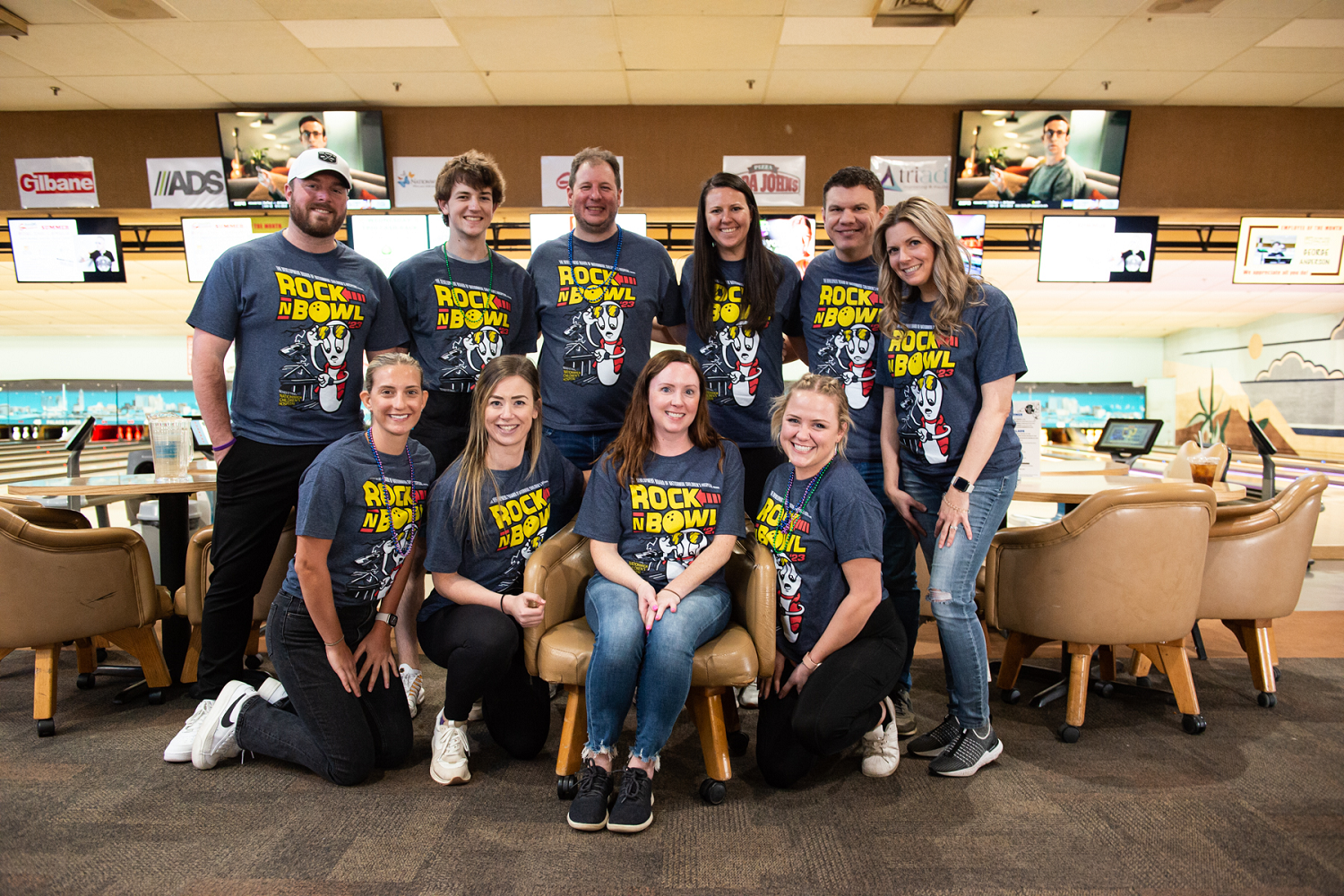 group in a bowling alley at "rock in bowl"