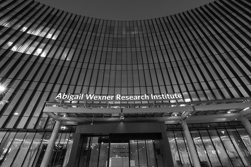 A black and white exterior shot of a building at the Abigail Wexner Research Institute at Nationwide Children's Hospital.