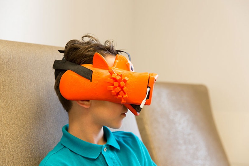 Child at Nationwide Children's Hospital wearing a virtual reality head piece.