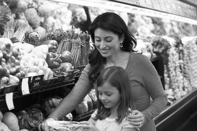 Mom and daughter shopping for groceries
